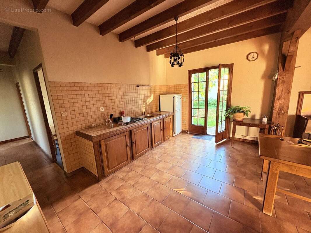 PRIGONRIEUX : Maison de plain-pied 5 pièces de 110m² avec jardin - photo 4