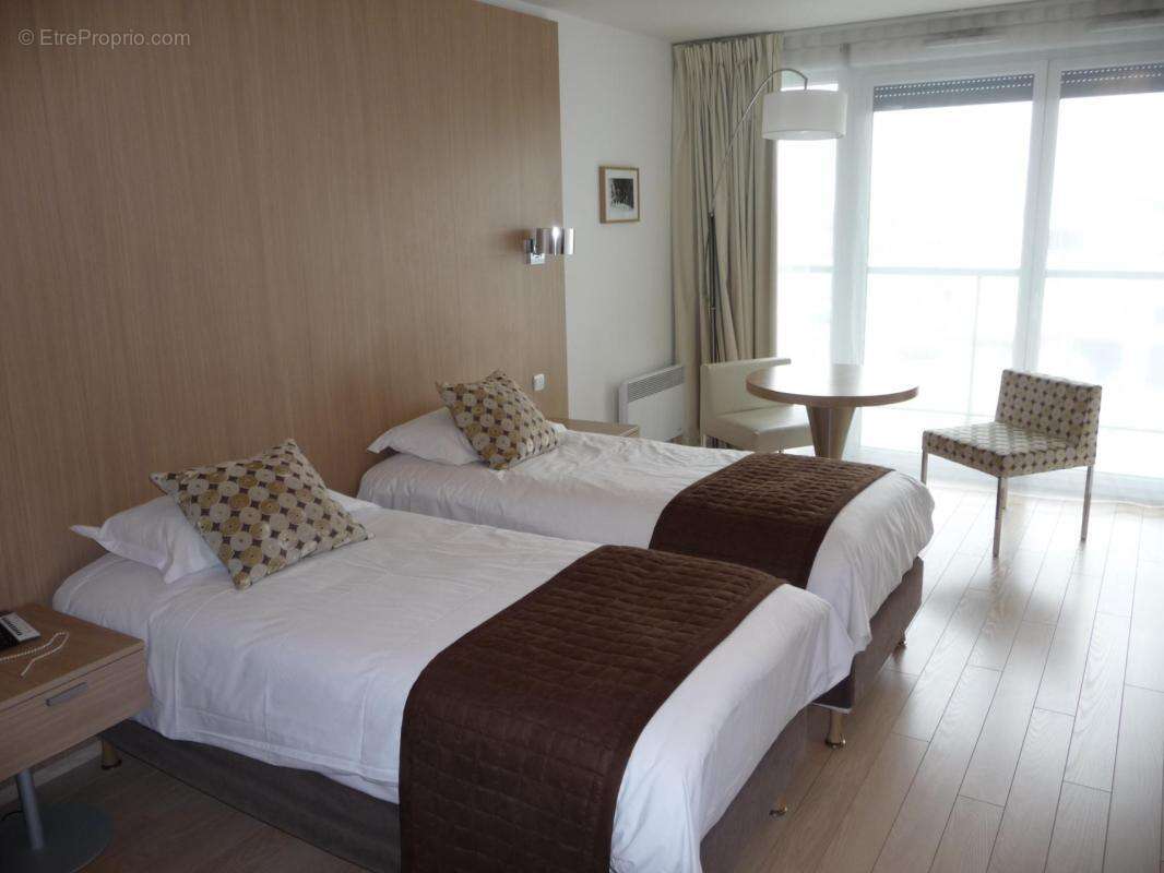 Vente studio - résidence de tourisme RESIDE ETUDES APPARTHOTELS à Carrières-sur-Seine - photo 2