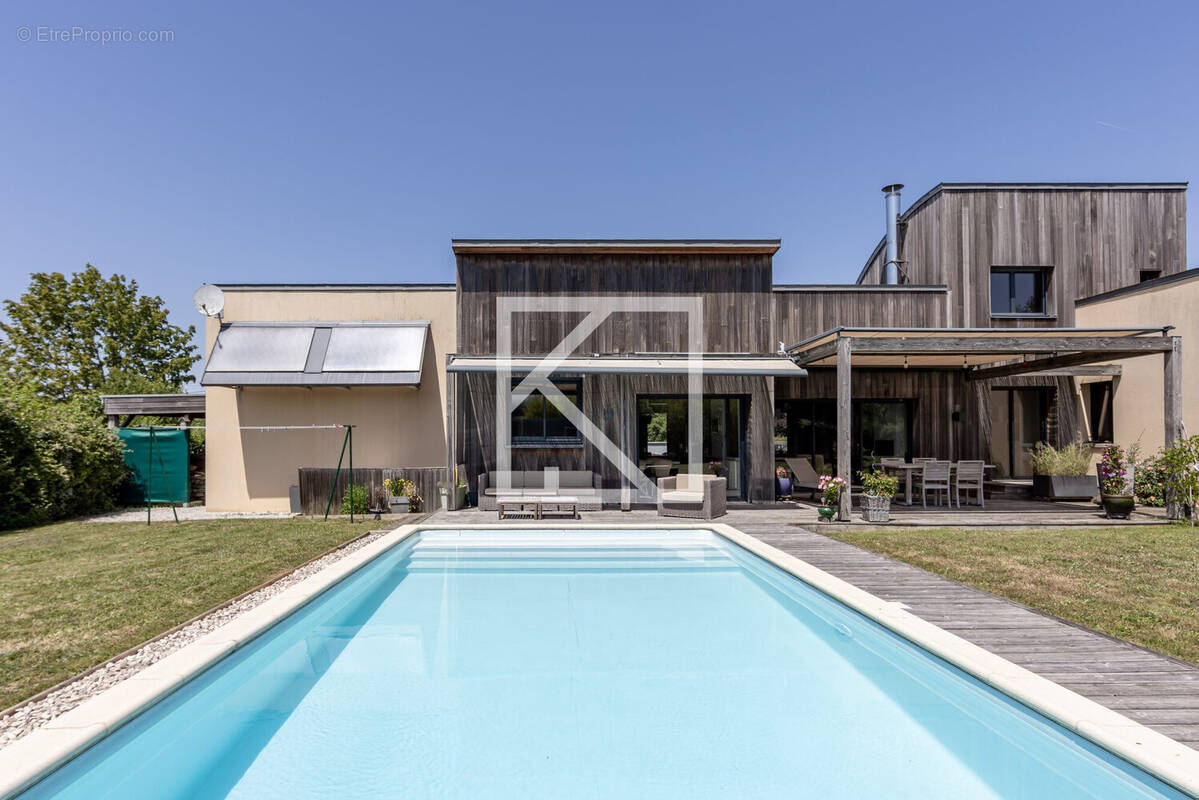 Maison à COULAINES