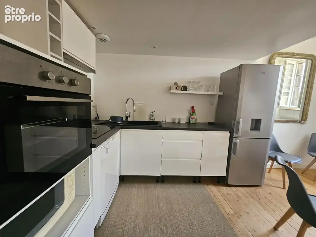 "DINAN -Place Saint-Sauveur : Appartement de caractère rénové avec vue sur "la Basilique" meublé ! - photo 7