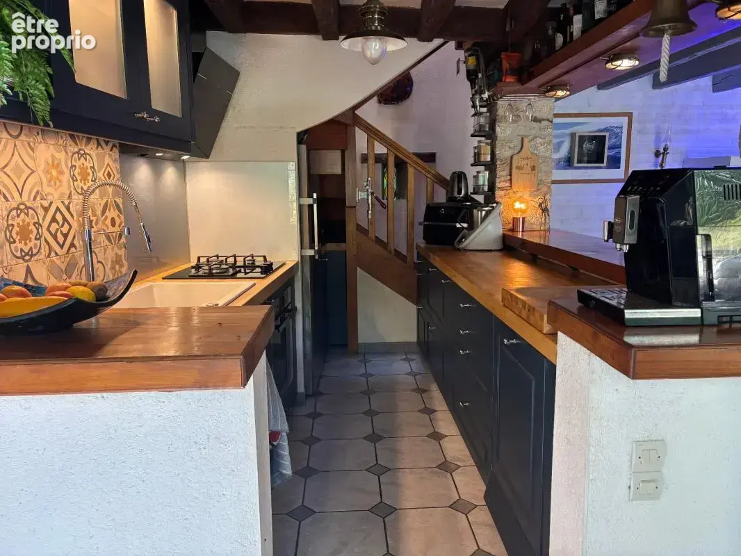 Maison en pierre , pleine de charme - 3 Chambres et mezzanine - COURNON - photo 3