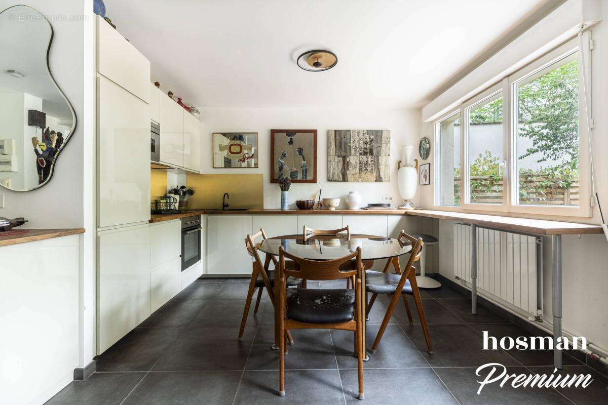 Duplex de 100 m2 avec jardin privatif de 51 m² – À deux pas des Buttes-Chaumont - photo 12