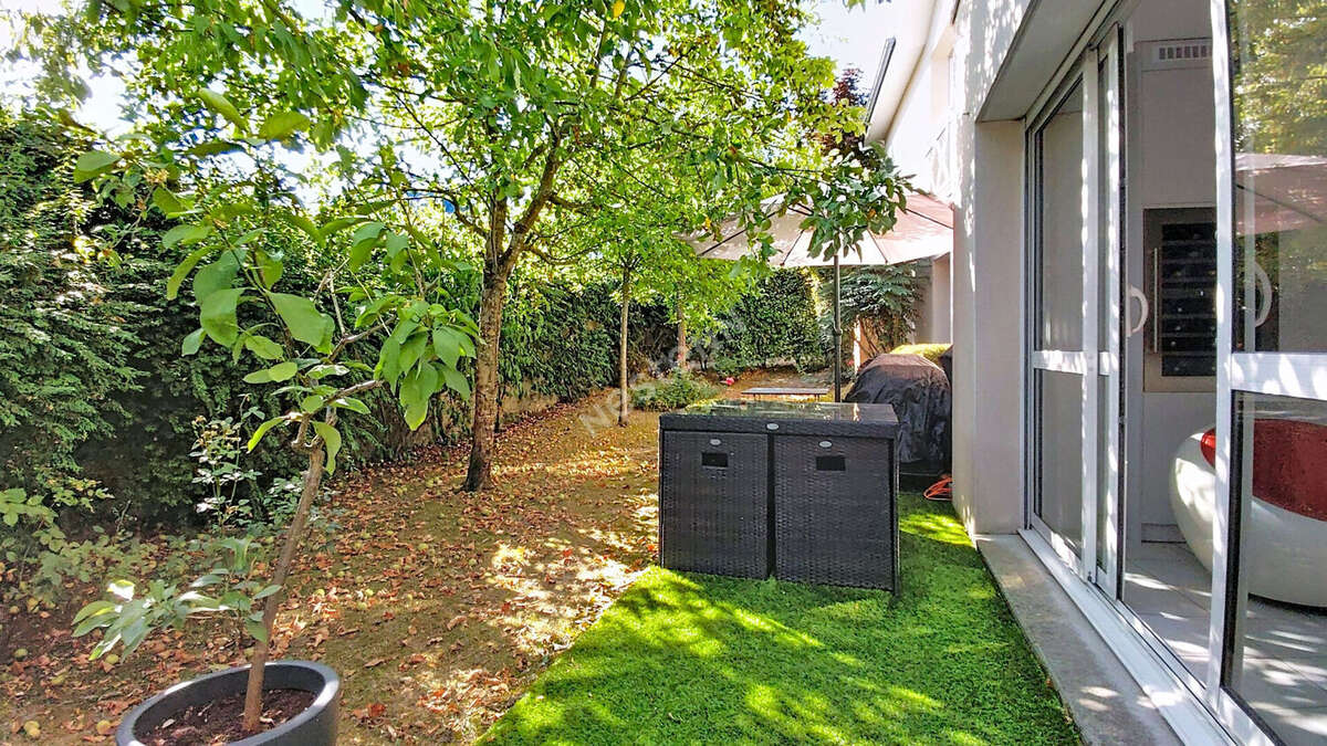 NANTES - SAINT-PASQUIER / Appartement 3 pièces 84m² deux chambres, jardin privatif, stationnement sécurisé - photo 9