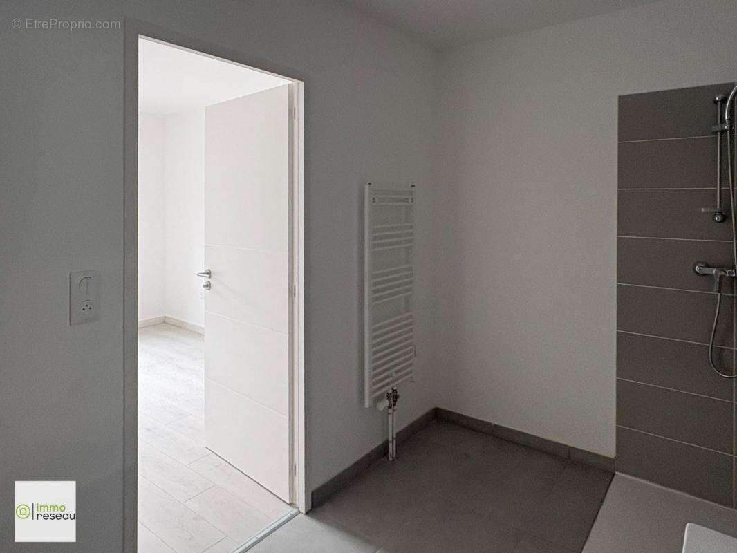 Appartement en rez-de-jardin - photo 6