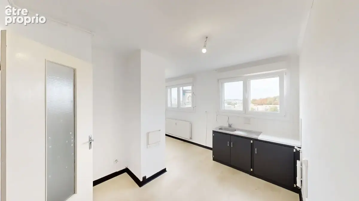Appartement 4 pièces à vendre à Besançon - 10ème étage avec vue panoramique - photo 5