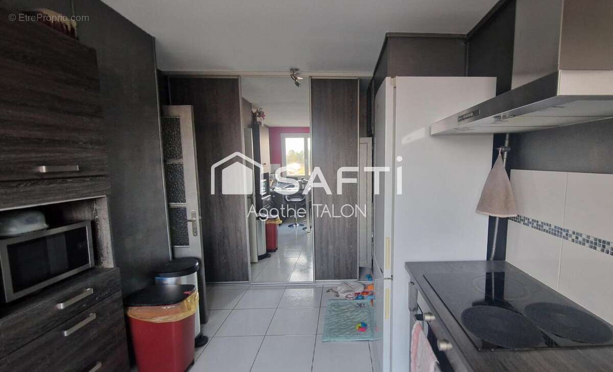 Photo 3 - Appartement à RILLIEUX-LA-PAPE