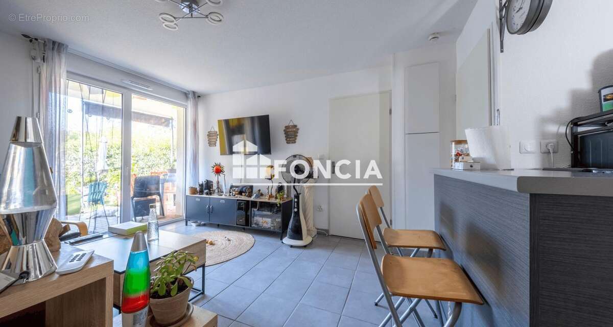 Appartement T2 en RDJ avec parking - photo 4