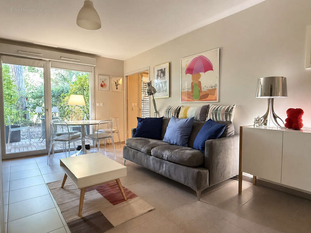Aux portes de Saint-Cyr-au-Mont-d'Or   T3 de 67 m2 en rez-de-jardin avec terrasse, garage - résidence sécurisé - photo 5
