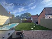 Maison à COURTONNE-LES-DEUX-EGLISES