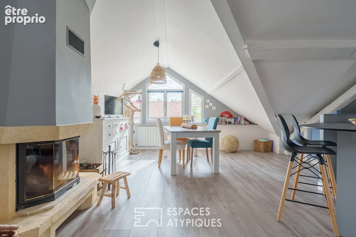 Appartement sous les toits à la charpente apparente - photo 2