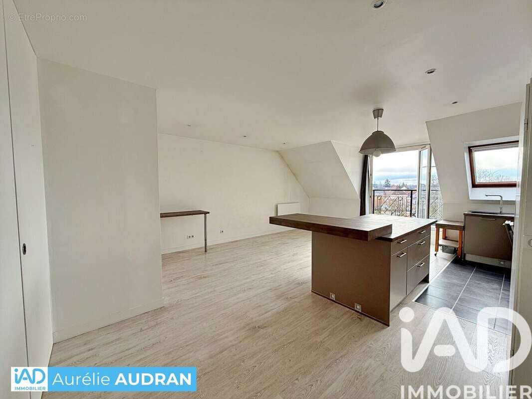 Photo 8 - Appartement à VOISINS-LE-BRETONNEUX