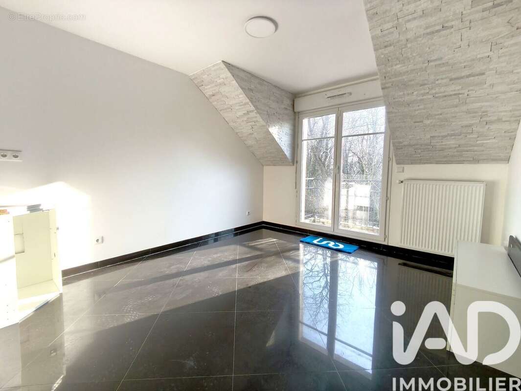 Photo 2 - Appartement à QUINCY-VOISINS