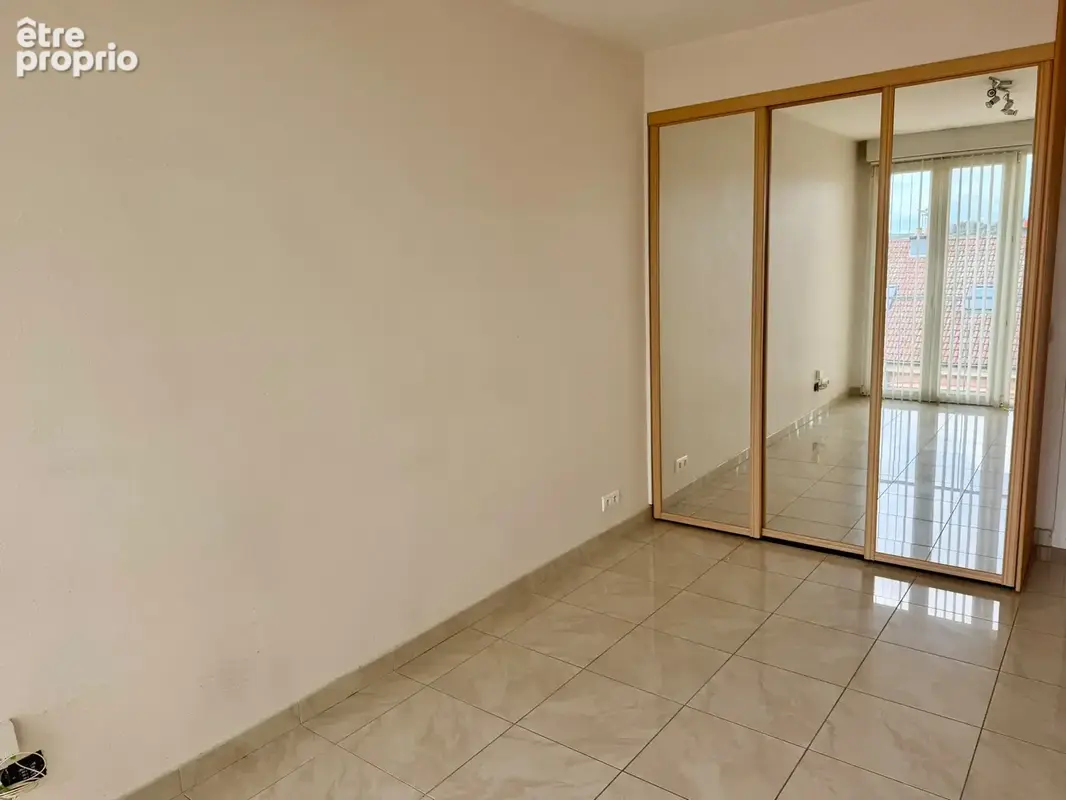 Vente - Belfort   Appartement 6 pièces de 113 m2, 4 chambres, cave et garage - photo 15