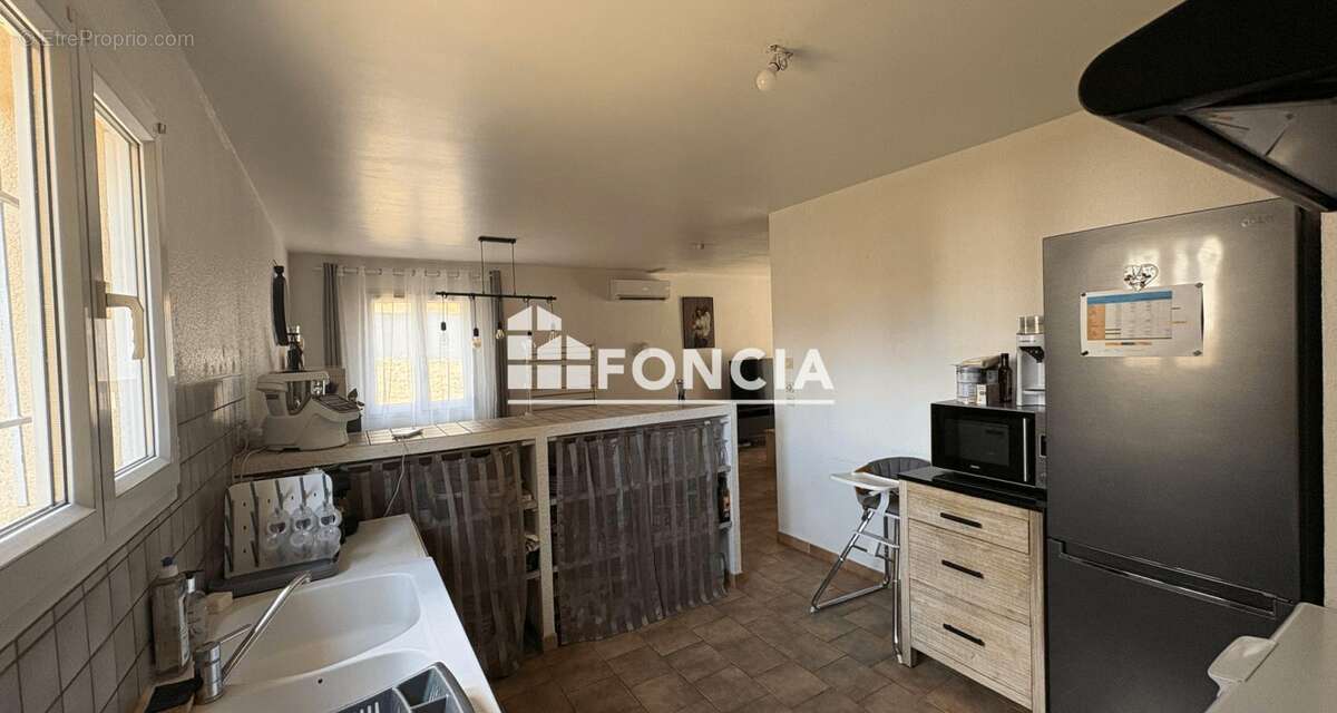 Maison T4 de 87 m2 de plain pied à Collorgues - photo 2