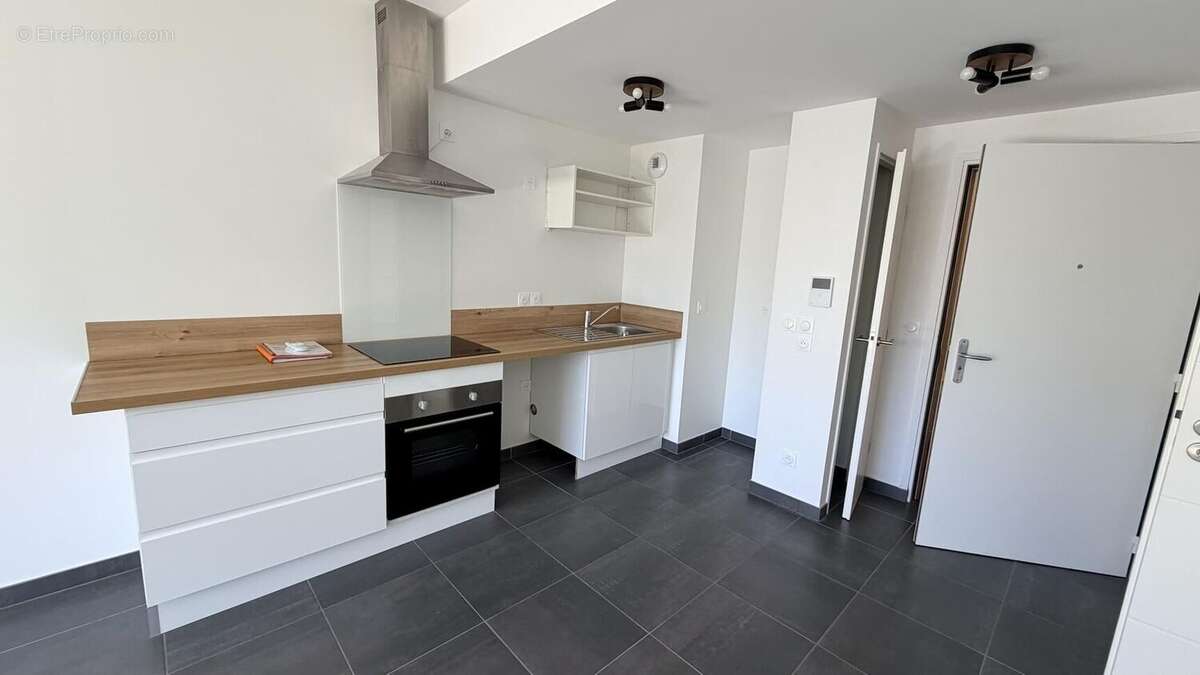 Photo 4 - Appartement à LA TOUR-DE-SALVAGNY