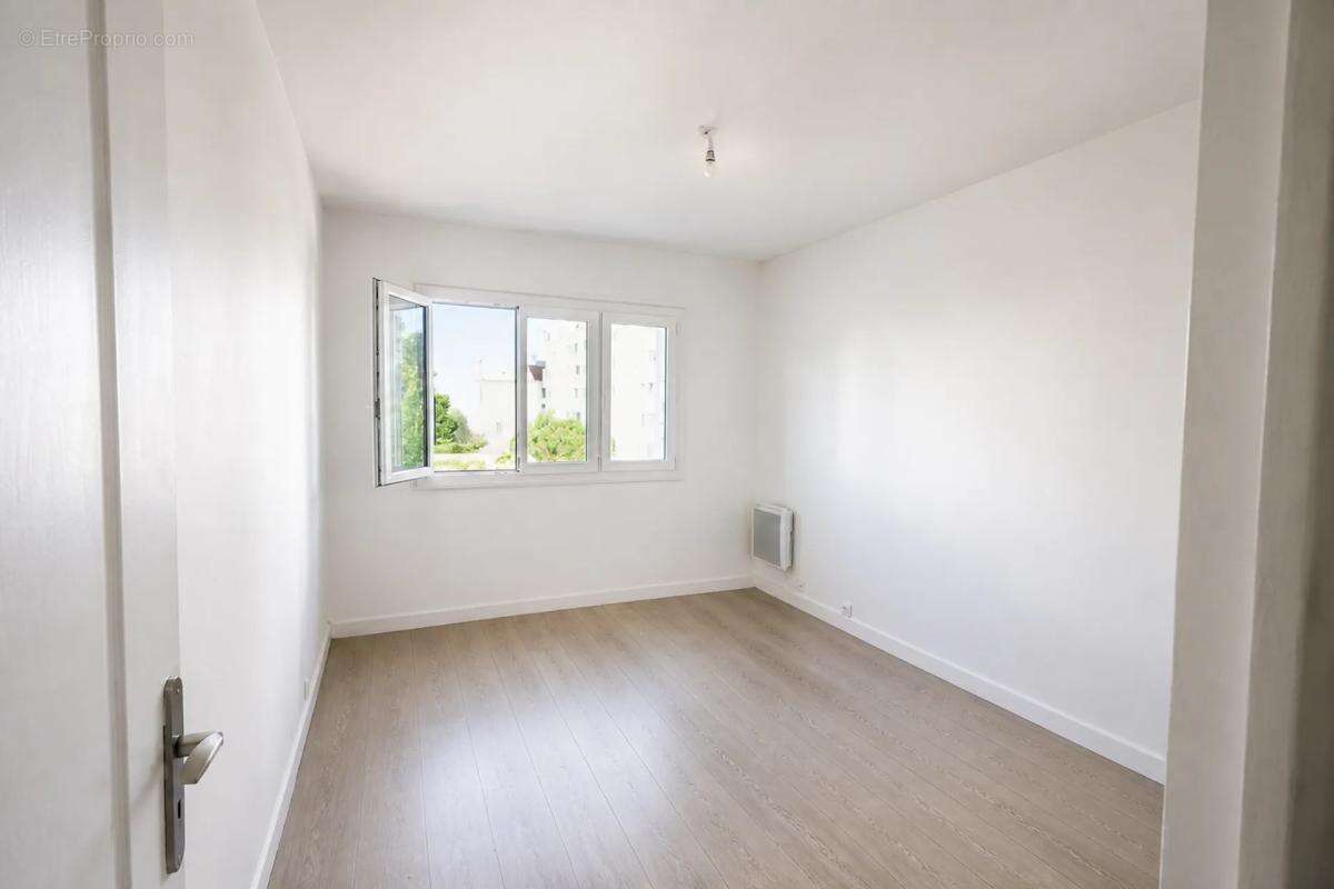 Grand T3 traversant, lumineux, avec balcon filant - 58,29 m2 - photo 5