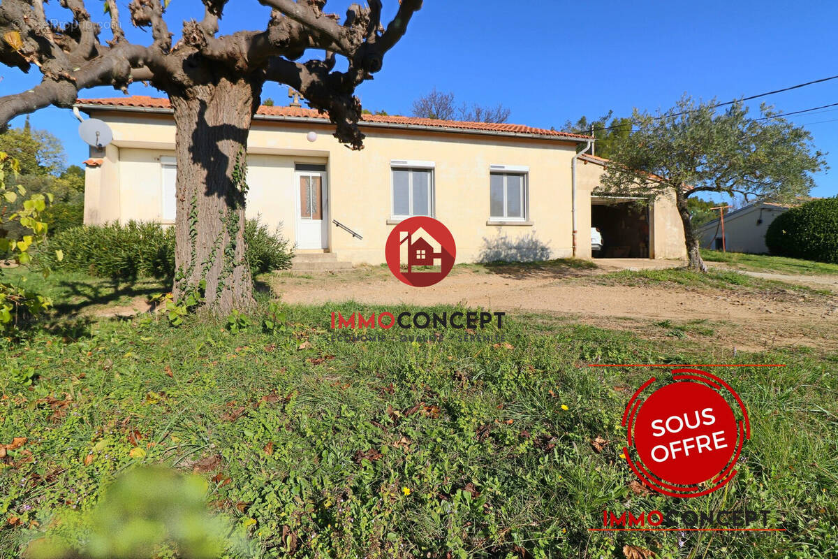 Maison à LAUDUN-L'ARDOISE