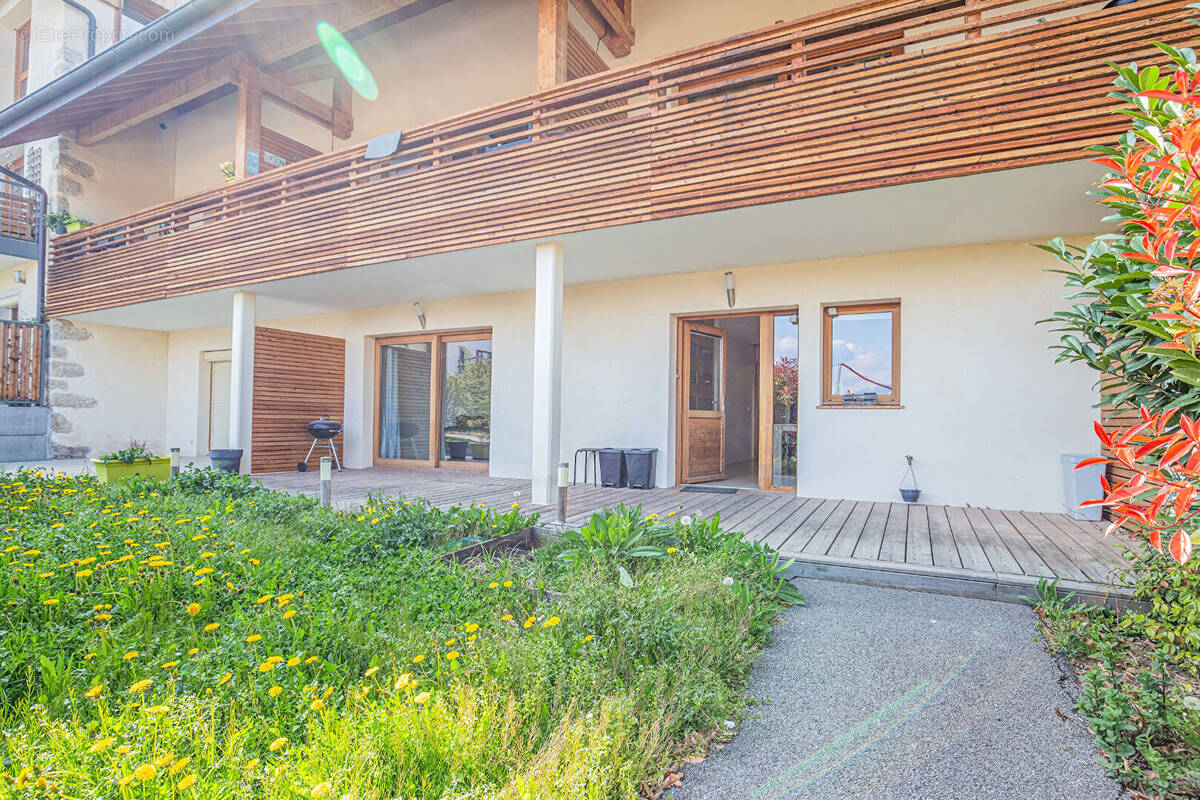 Agence immobiliere laforet - exclusivite - "cyprès" - poisy - appartement rez-de-jardin t3 de 63,66m² - cave - place privative c - photo 1
