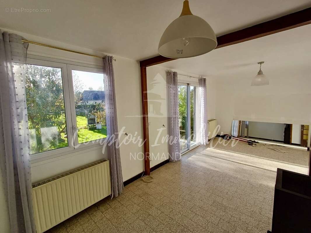 Maison à THIL-MANNEVILLE