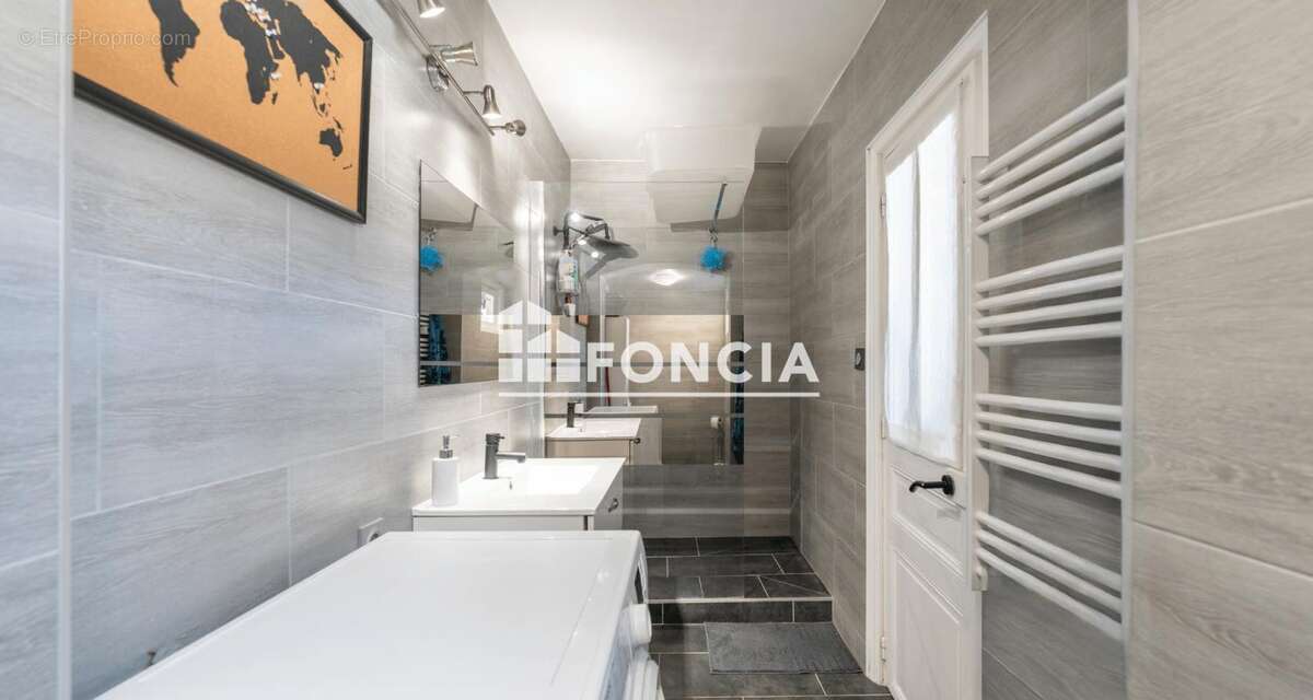 FONCIA Le Raincy vous présente cette charmante maison de plain-pied avec jardin - photo 11