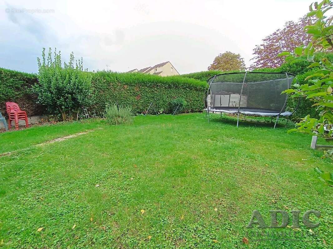 Maison 111 m² à Le Plessis-Belleville  - photo 9