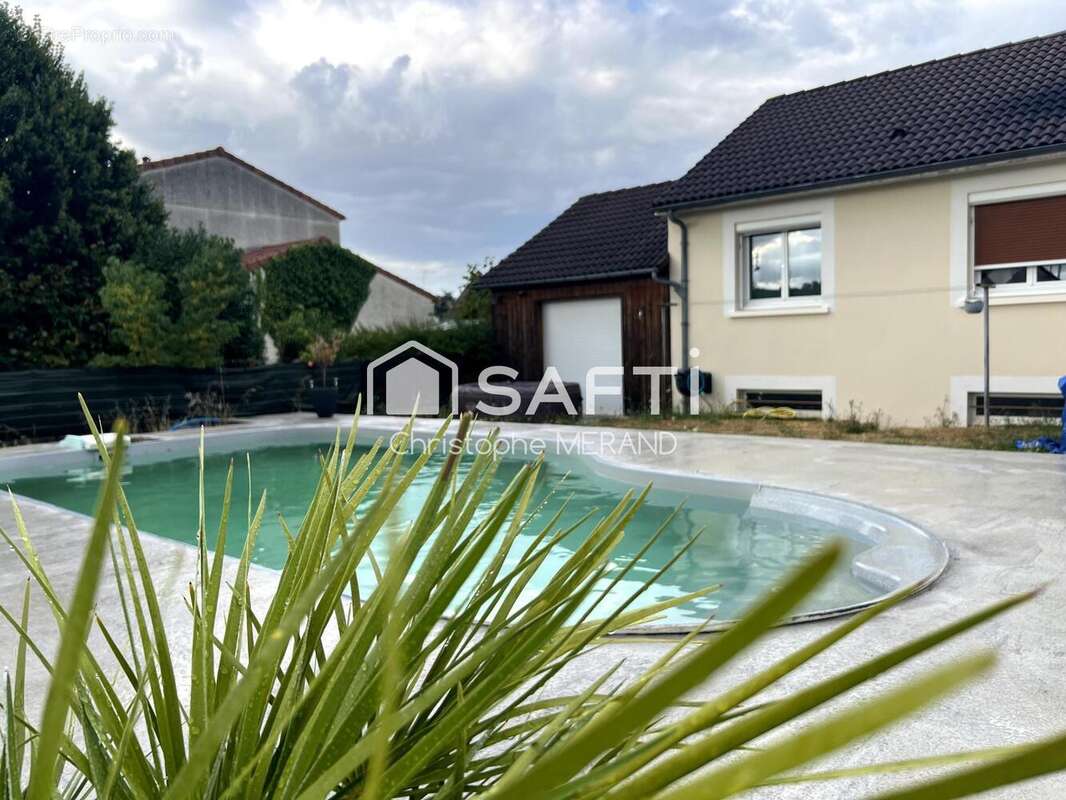 Photo 2 - Maison à DANGE-SAINT-ROMAIN