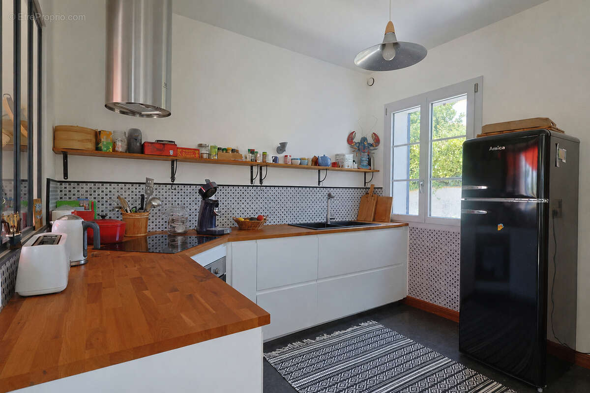 EMPLACEMENT PRIVILÉGIÉ - Maison chaleureuse de 115 m² avec terrasses - photo 3