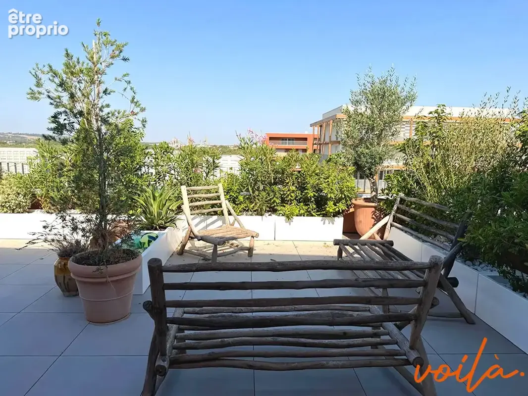 REF : HELMUT - MONTAUDRAN - Appartement dernier étage avec 2 places de parking et terrasse - photo 2