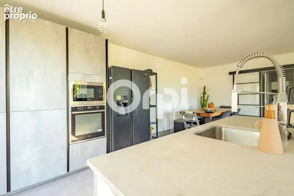 Appartement 5 pièces de 91m² avec Jardin de 50m², deux places de stationnement en sous sol - photo 5
