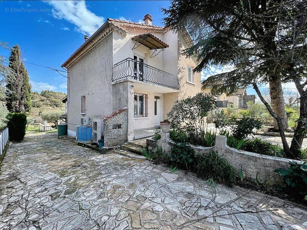 Photo 1 - Maison à SAINT-JULIEN-LES-ROSIERS
