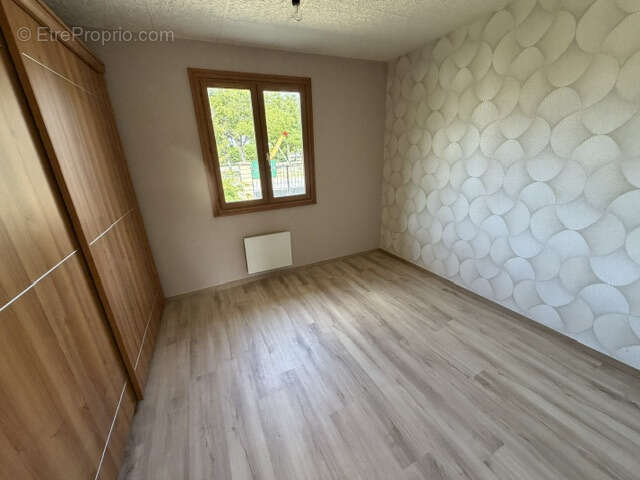 Maison de plain-pied avec garage sur terrain de 900 M2 - photo 12