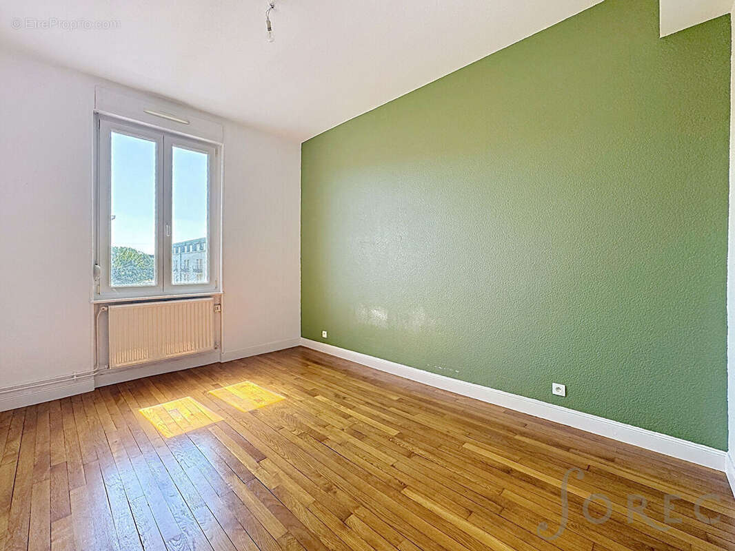 Appartement F4 de caractère avec balcon à proximité immédiate de la Gare - photo 6