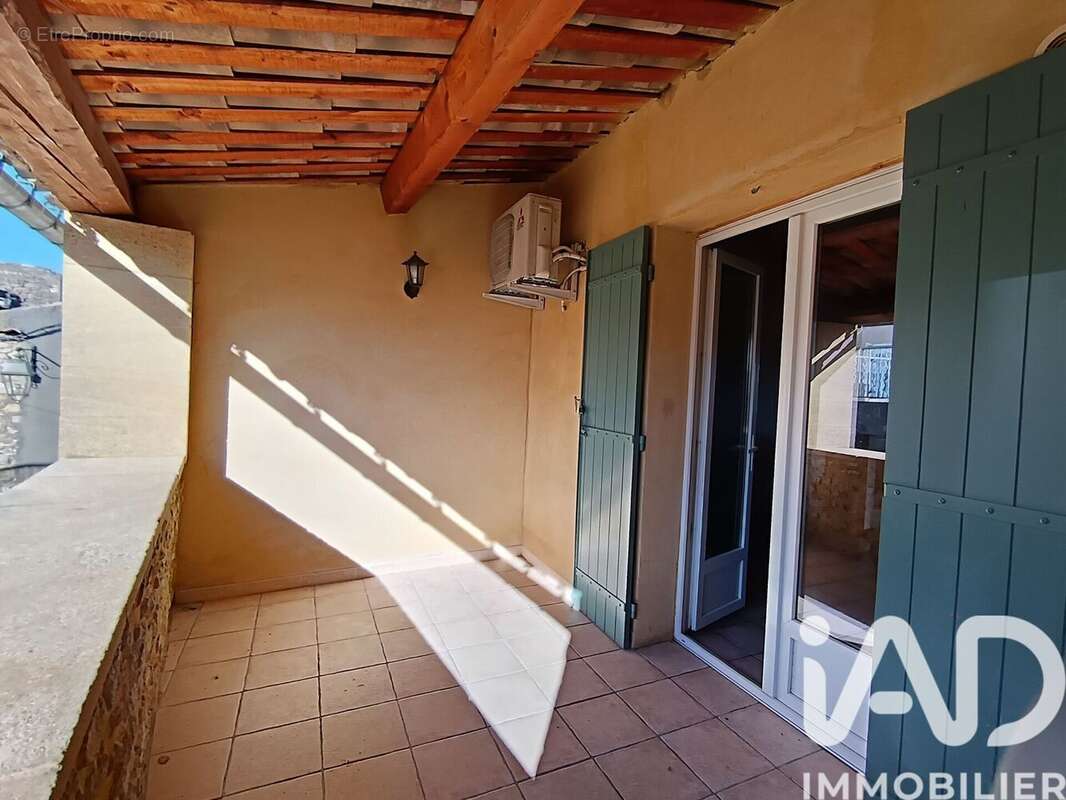 Photo 3 - Appartement à SAINT-JULIEN-DE-PEYROLAS