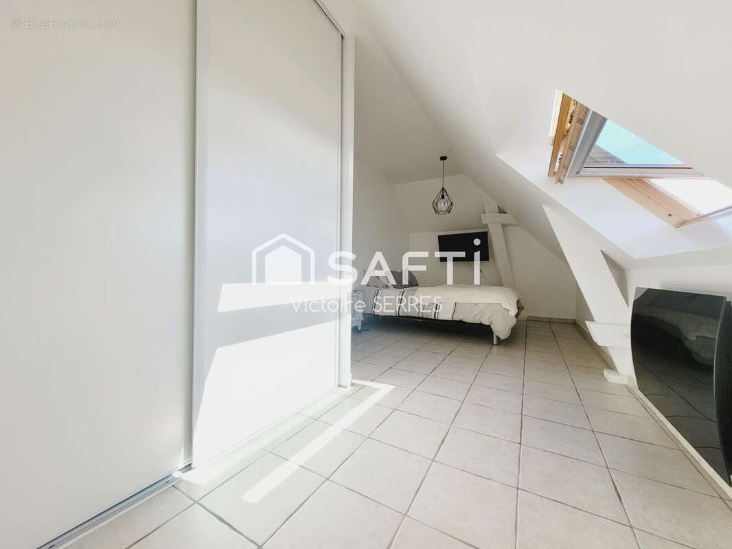 Photo 9 - Appartement à HEROUVILLE-SAINT-CLAIR