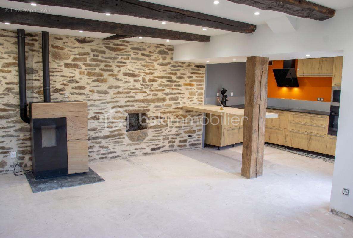 Maison en pierre de 100 m², 4 chambres, atelier et terrasse couverte - photo 4