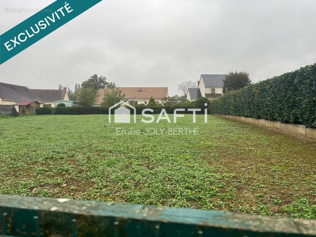 Photo 1 - Terrain à AUVERS-LE-HAMON
