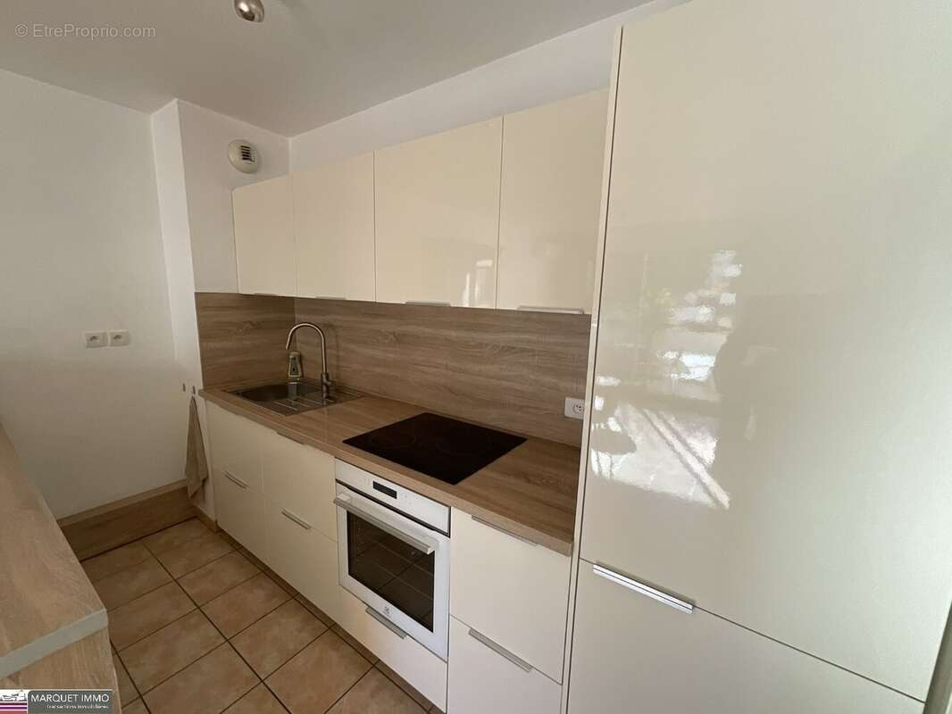Agréable appartement T3 offrant 51 m² avec terrasse de 6 m² en rez-de-jardin d'une résidence sécurisé avec des espaces verts des - photo 12