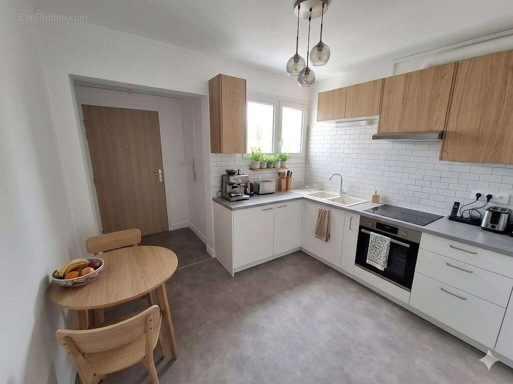 T3 de 62,30 m² à Fontaines-sur-Saône au prix de vente de 125 300 € - photo 2