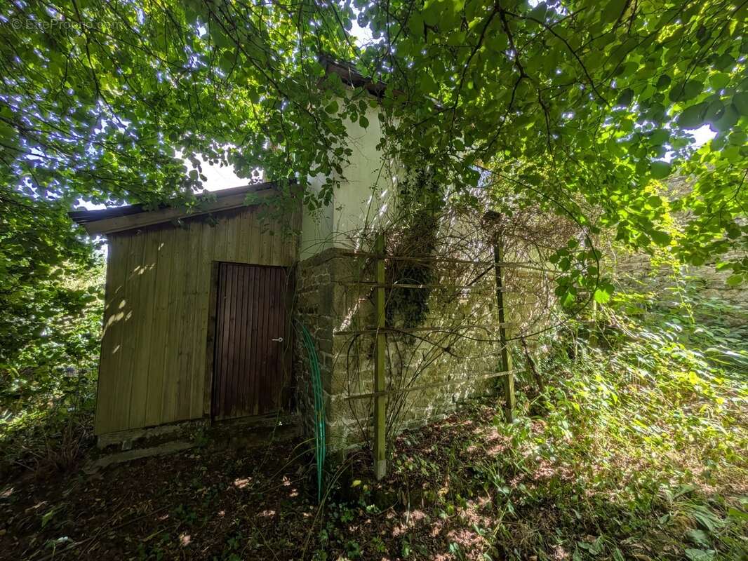 Guemene sur scorff maison bourgeoise  7 pièces 185 m² environ avec garage et dépendances,un puits une parcelle de 3706m² - photo 33