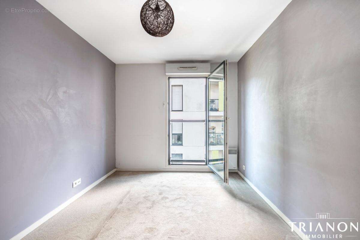 Appartement 68 m2  Asnières / 3 pièces -2 chambres  - Balcon- 2 places parking - photo 14
