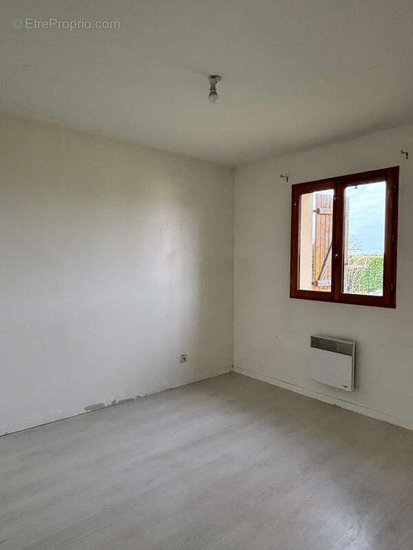 Maison traditionnelle de plain-pied, alliant confort et fonctionnalité - photo 3