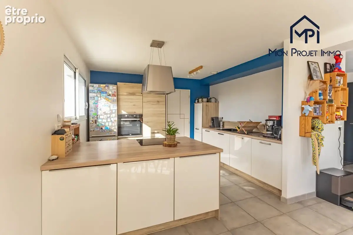Maison 6 pièces 107 m² à vendre à Le Genest-Saint-Isle (53940) - photo 3