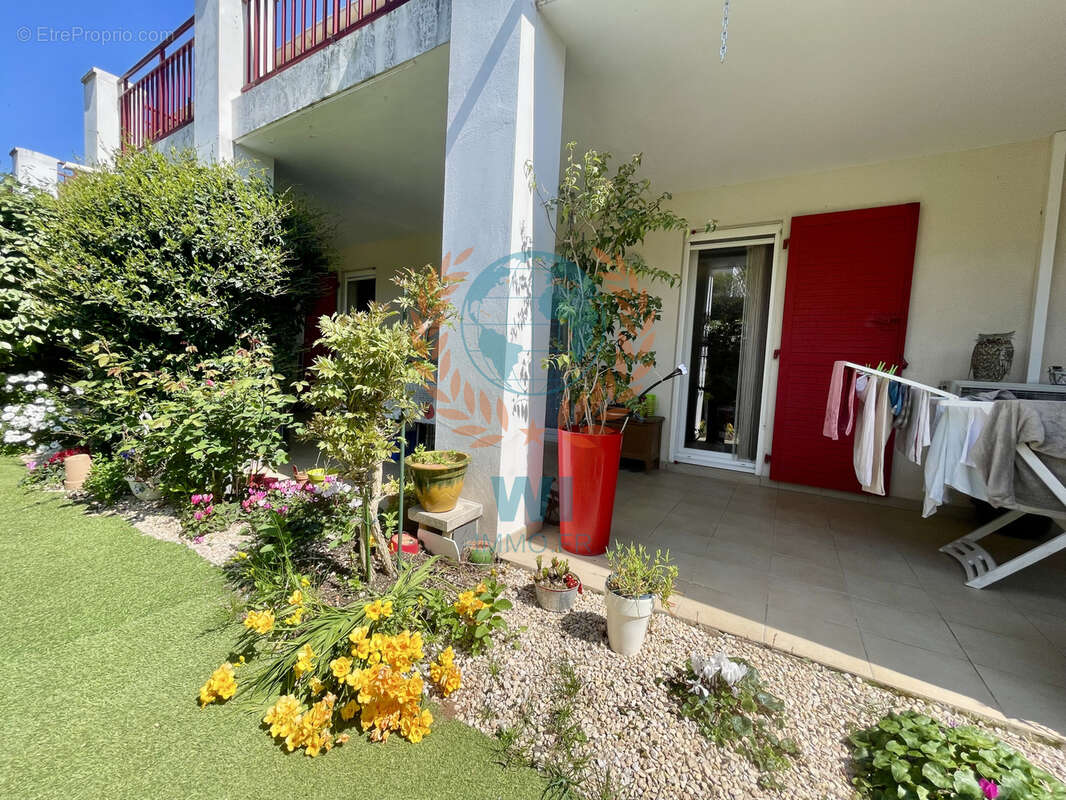 Appartement  en rez-de-jardin avec piscine et garage - photo 13