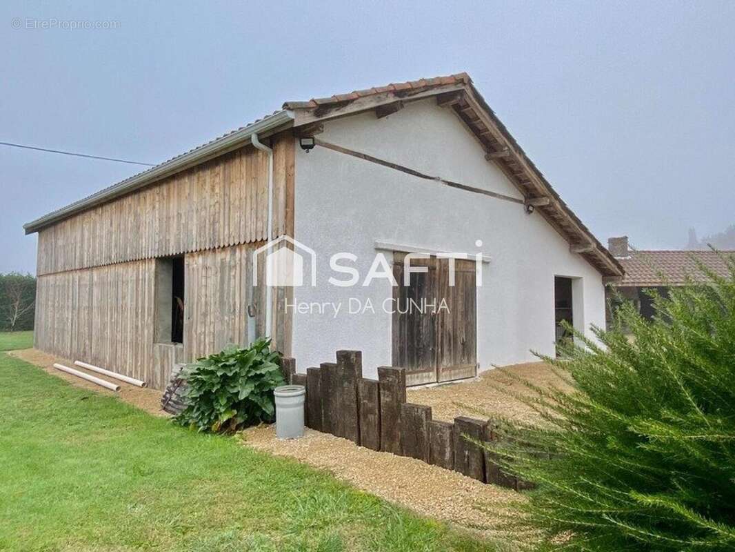 Photo 5 - Maison à YGOS-SAINT-SATURNIN