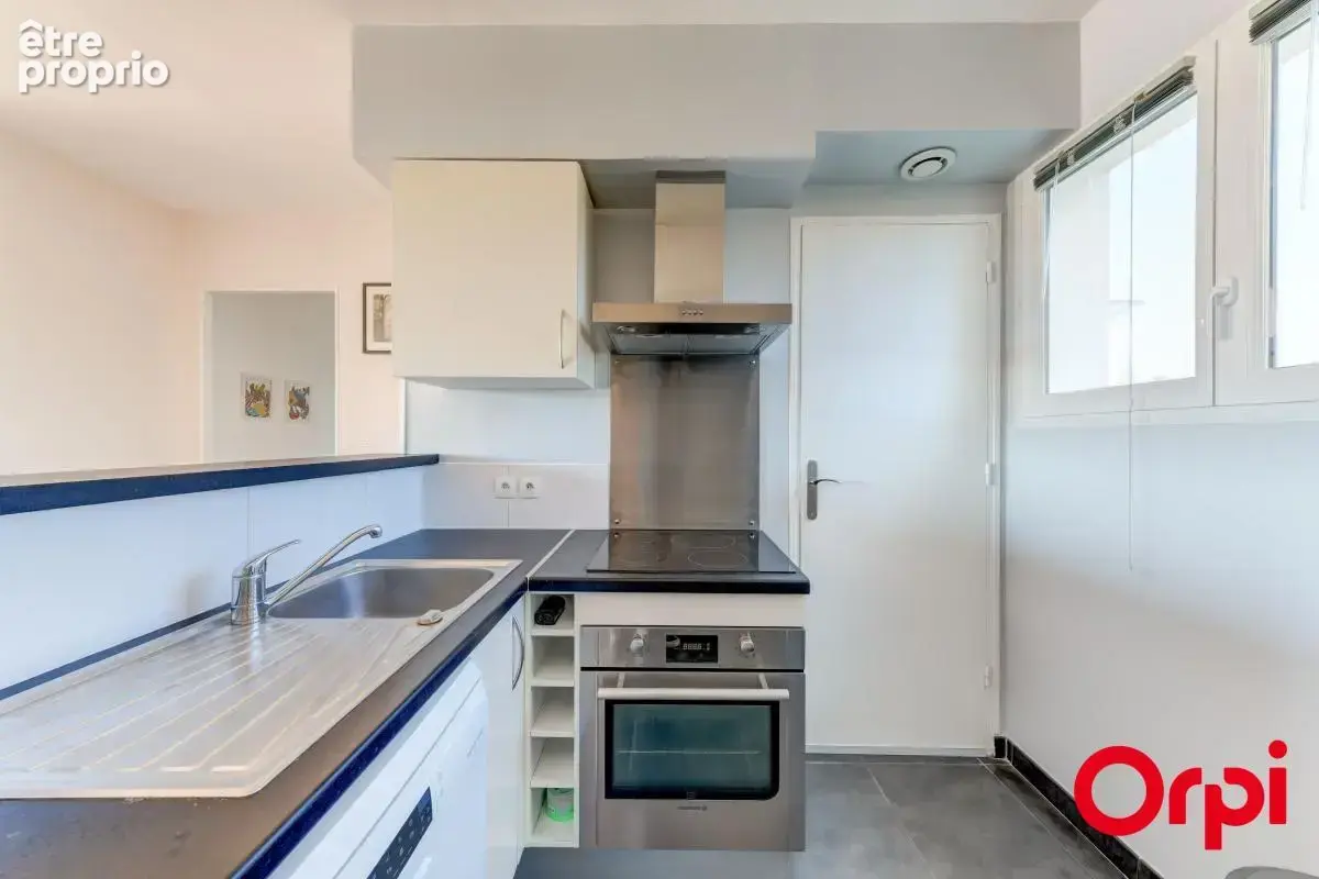 CALUIRE CENTRE BOURG - T3 de 58 m² avec vue dégagée - photo 8