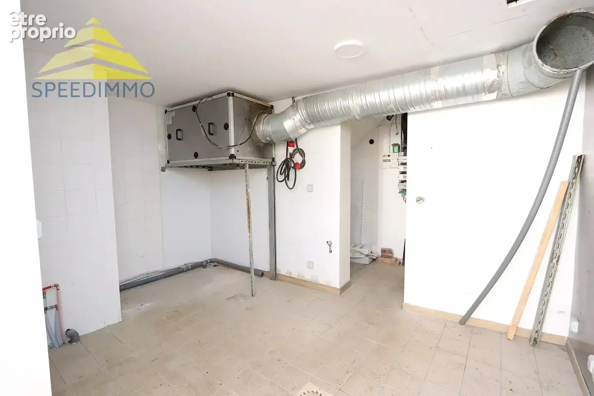 Immeuble de rapport – commerce + 3 appartements - photo 7