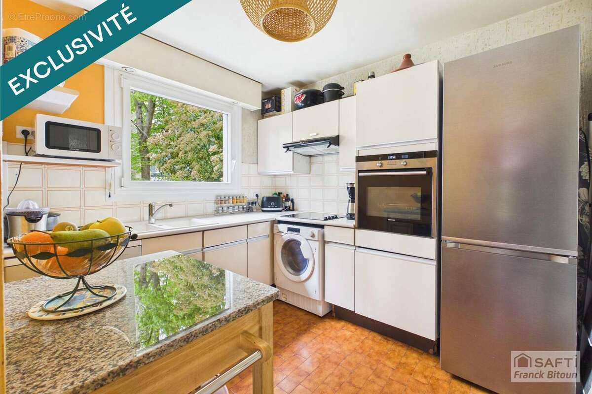 Photo 4 - Appartement à COURBEVOIE