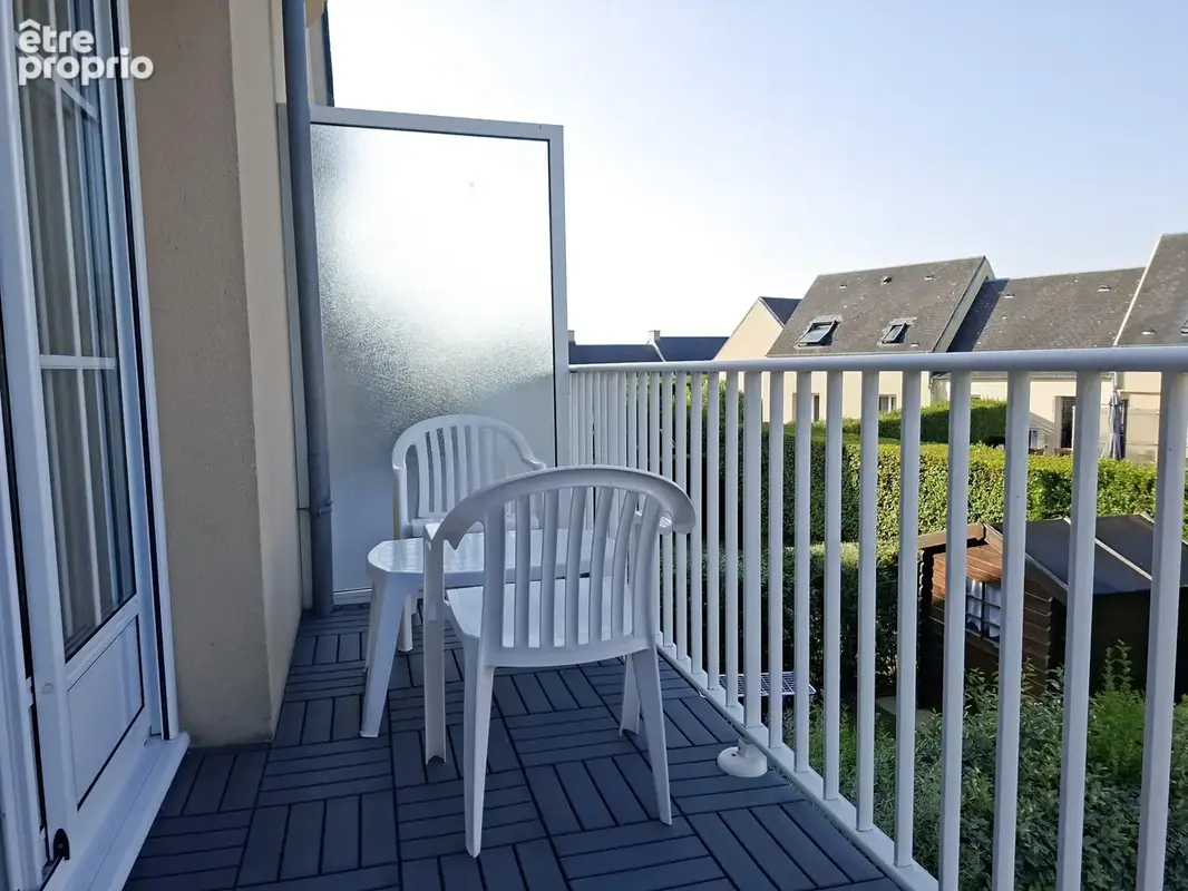 Appartement duplex avec balcon et 2 places de parking - photo 4