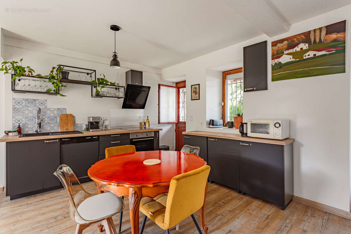 Maison mitoyenne T4 avec jardin et garage - photo 4