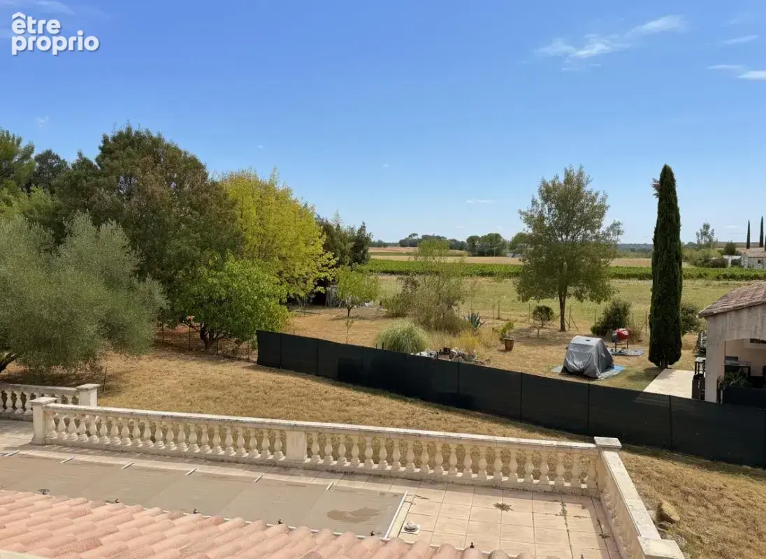 Maison familiale avec piscine ,forage, chambre de plain-pied et terrain de 1 600 m² à Saint-Hilaire-de-Brethmas - photo 2